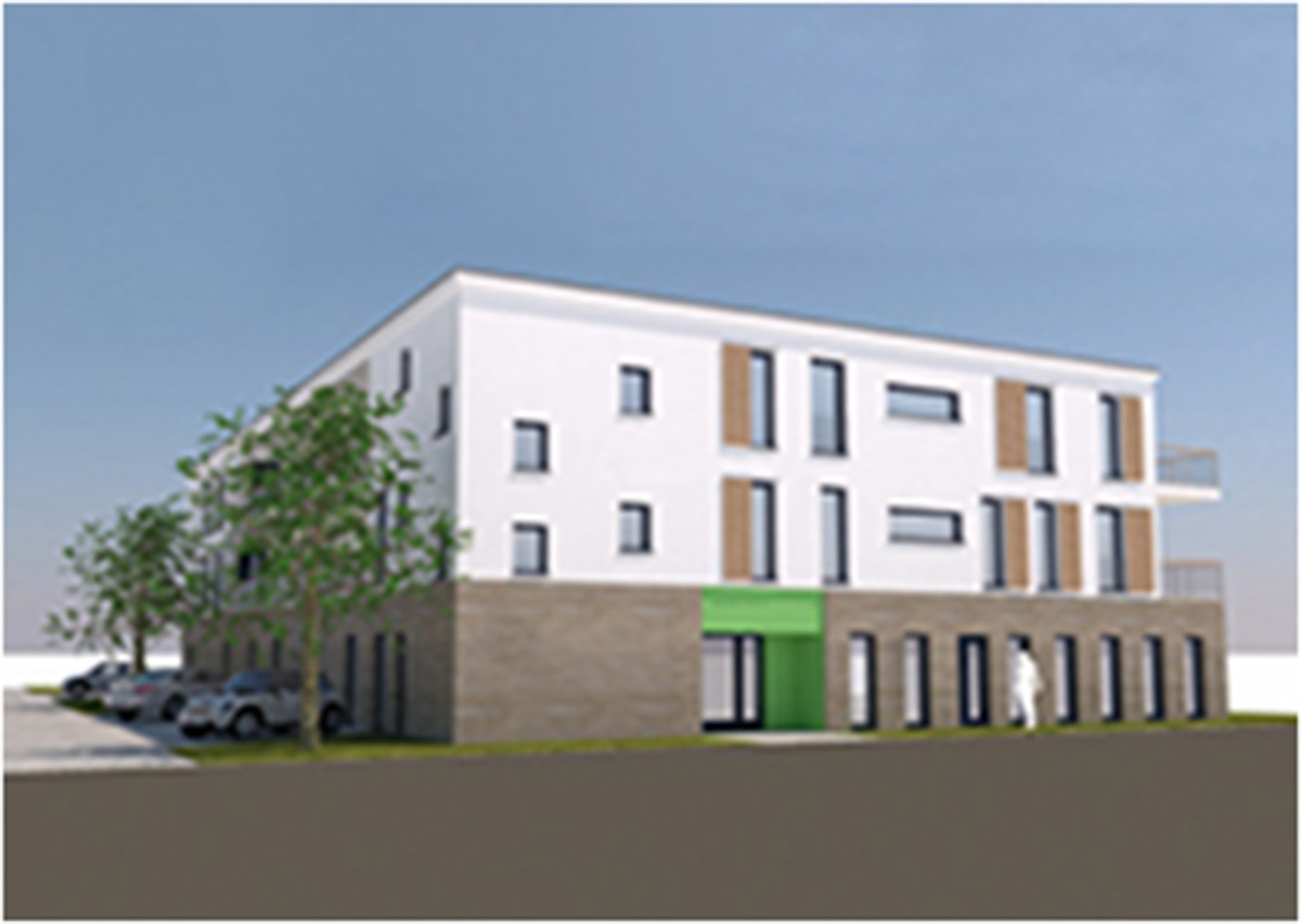 Ein modernes dreistöckiges Gebäude mit weißem und braunem Äußeren, großen Fenstern, einem grünen Eingang, geparkten Autos und ein paar Bäumen in der Nähe.